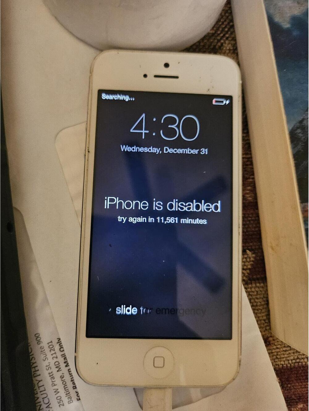 Apple iPhone 5 (i think) - White- charges and powers on. Working.